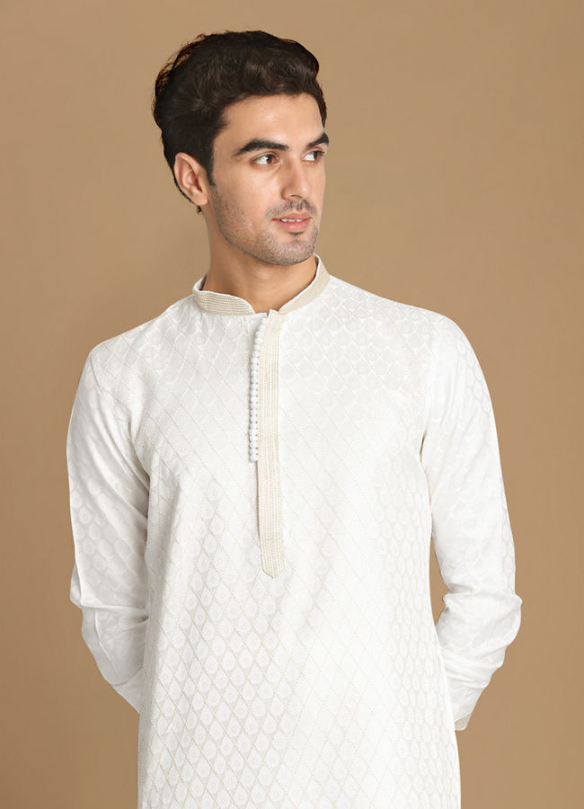 alt message - Manyavar Men White Self Design Kurta Set image number 0